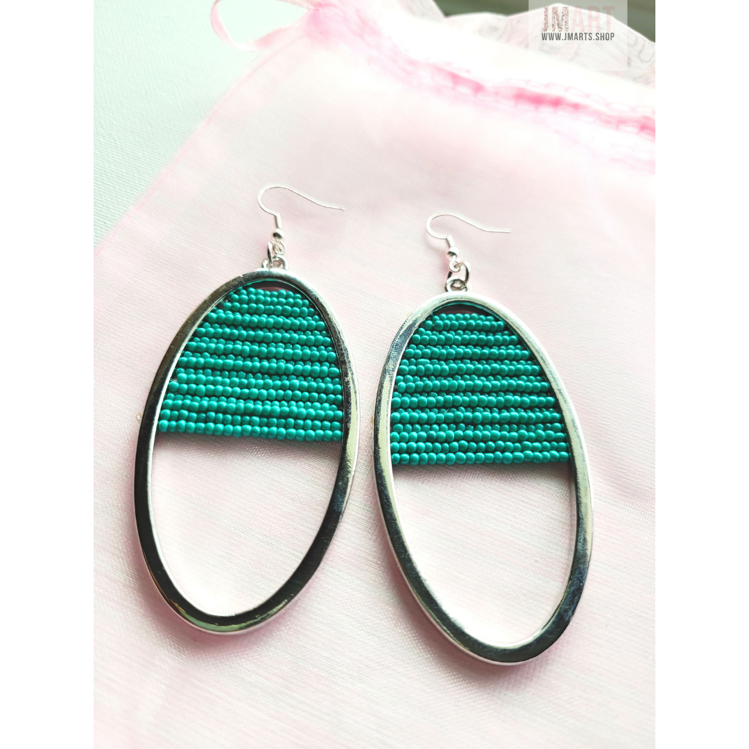 "Glass Half Full" teal beaded earrings